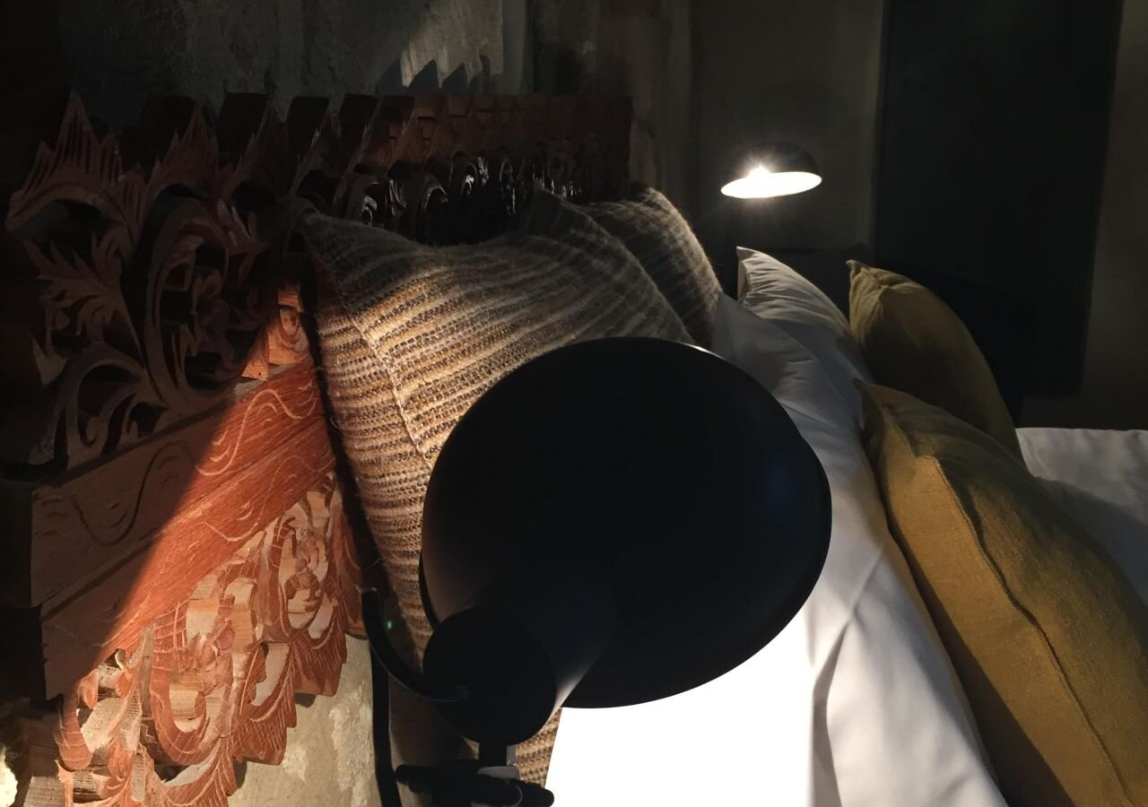 Chambre Guanaja avec murs en pierre à La Banasterie